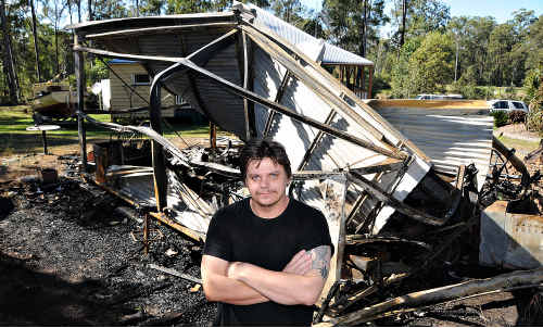 Collector Nathan Smith in front of his burnt-out shed which contained priceless artefacts from the Maheno and Cherry Venture shipwrecks. The fire last Friday morning destroyed a lifetime collection of maritime relics. Collector Nathan Smith in front of his burnt-out shed which contained priceless artefacts from the Maheno and Cherry Venture shipwrecks. The fire last Friday morning destroyed a lifetime collection of maritime relics.